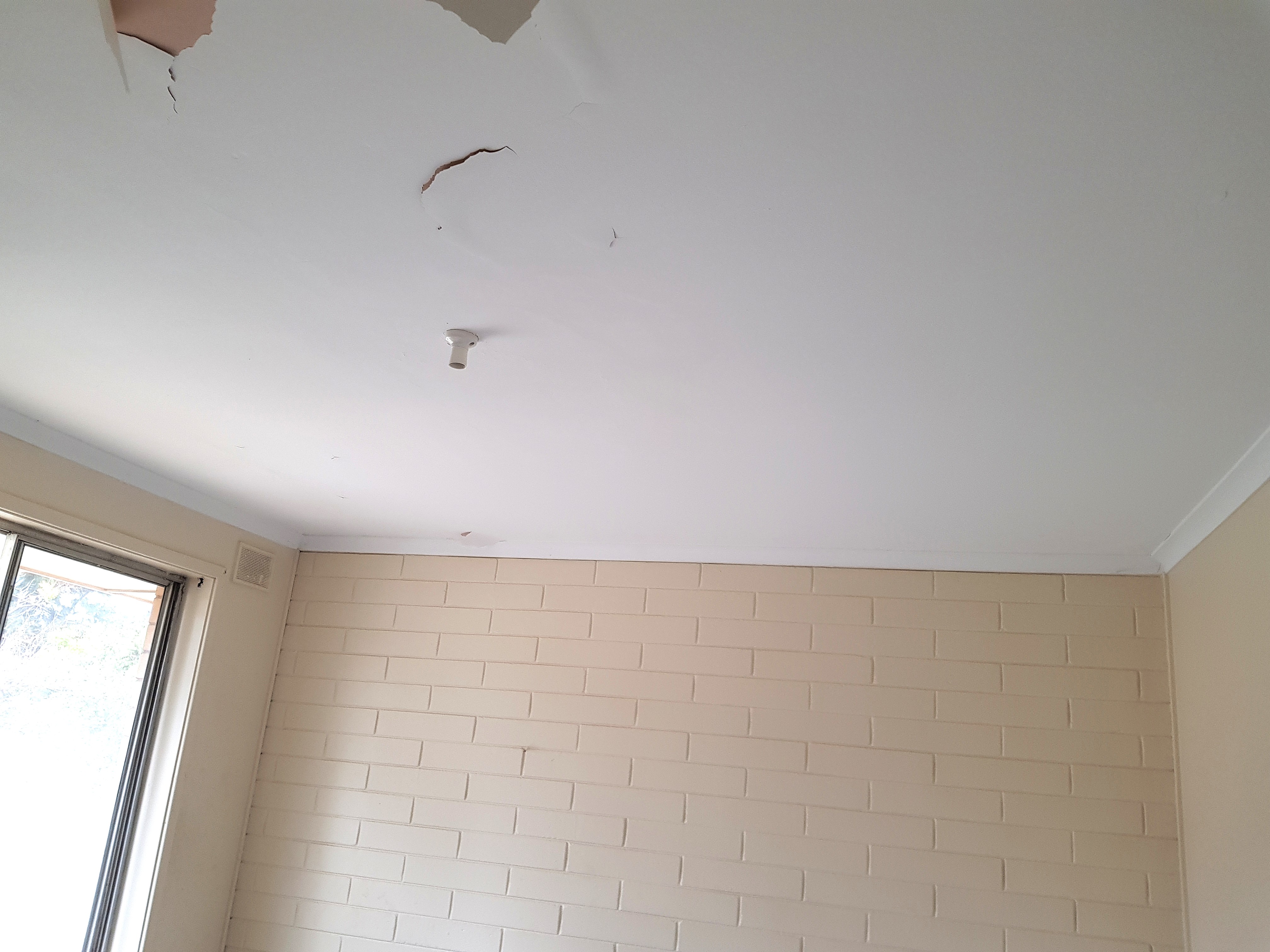 Residential peeling ceiling before in Perth